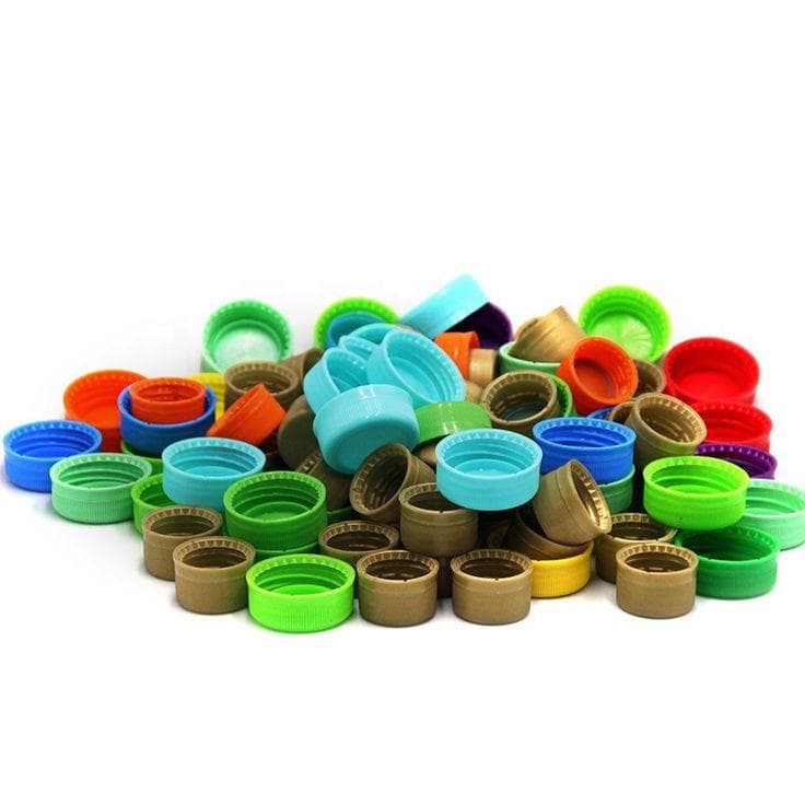 Assorted plastic caps and closures in custom colours